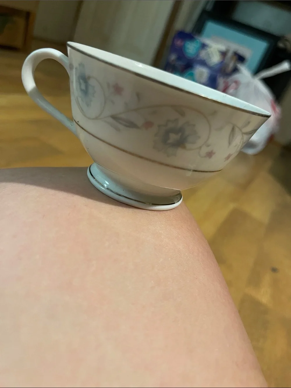 Elegant White Ceramic Teacup with Subtle Floral Accent